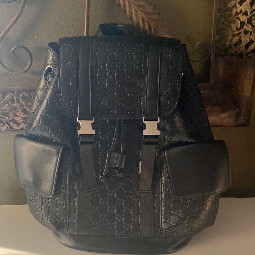 Gucci Black Leather Backpack with Silver Buckles